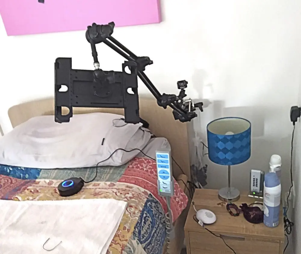 DA3-TAB Tablet Mount, on bed.webp