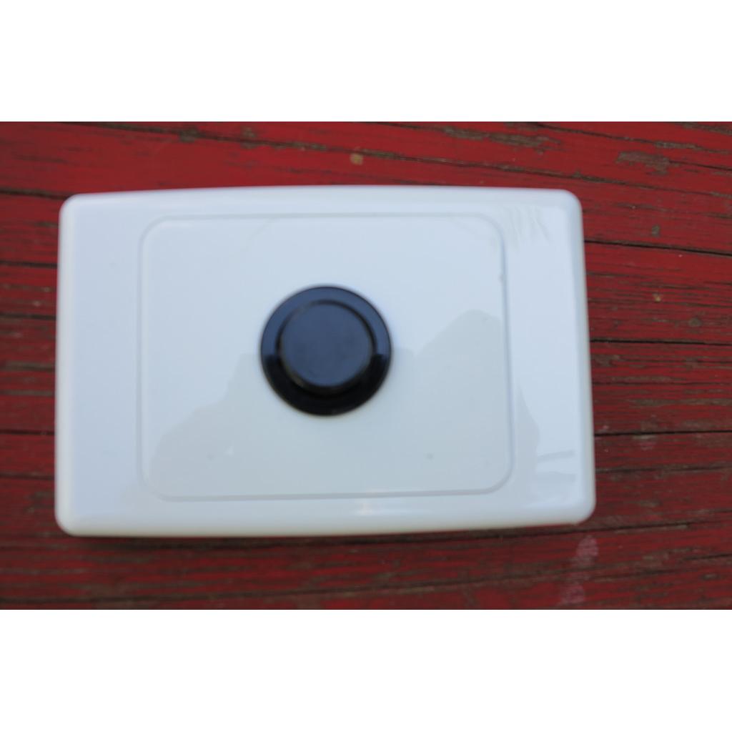 Push button black 20mm dia on single gang face plate